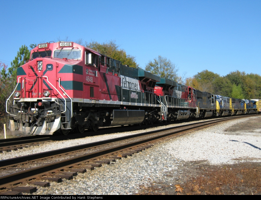 FXE and FXE leased CSX units on CSX AWP-WofA Subdivision Q601 headed westward from Waycross to Mobile and points west.